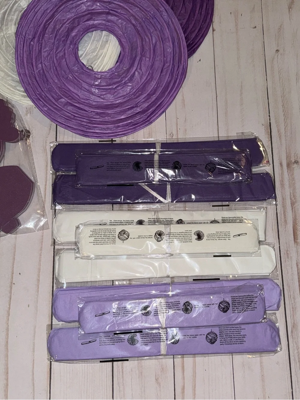 Purple and white party supplies